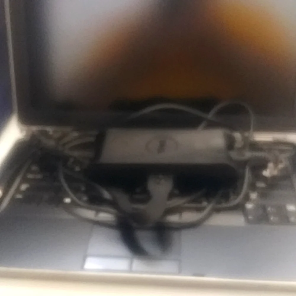 A 2012 Dell Latitude E6430 Notebook, black and gray, 14